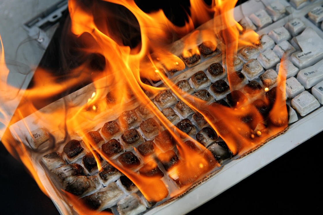 A computer on fire because of PrintNightmare