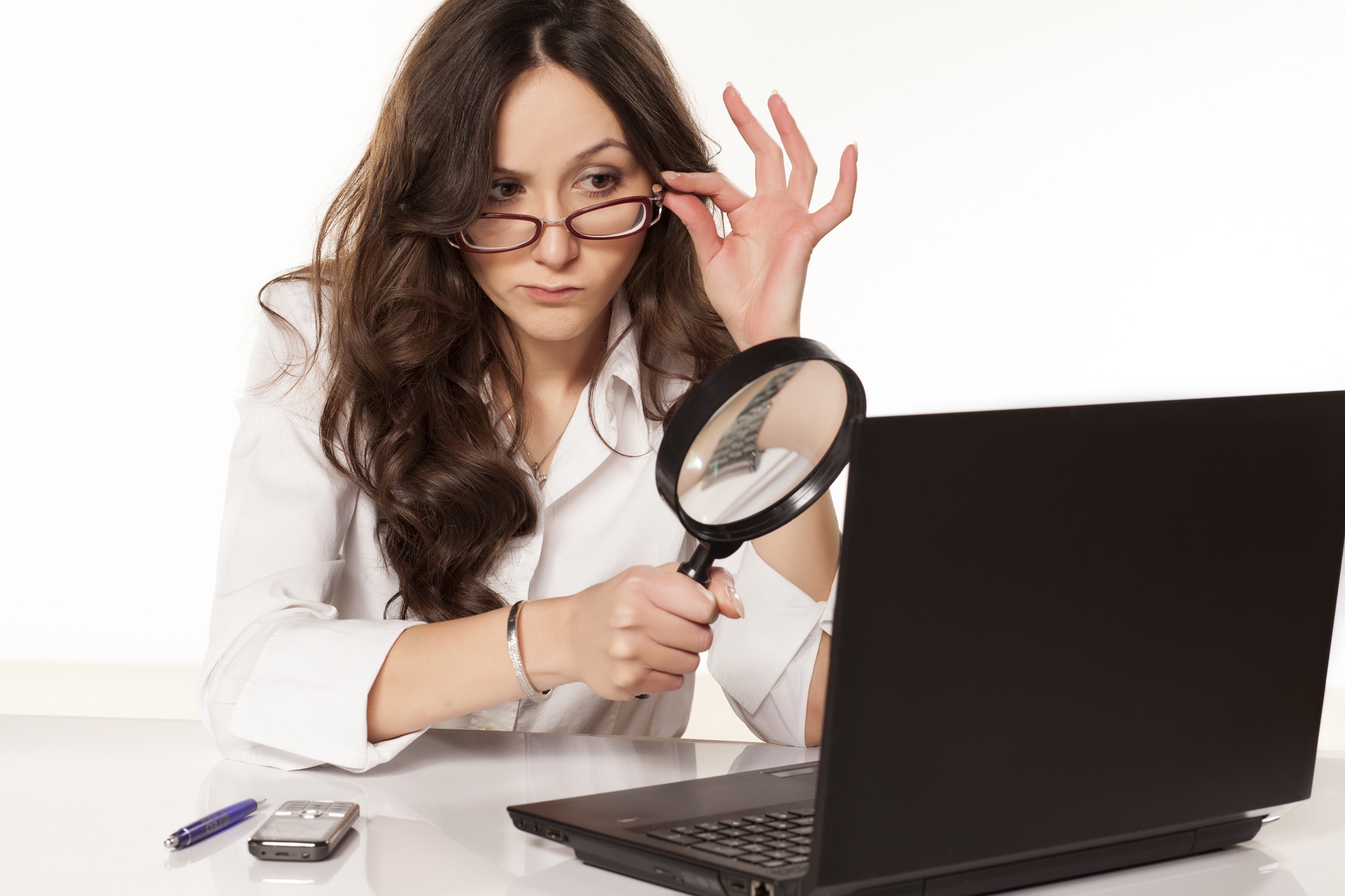 Business woman examining the results of her fully managed IT services