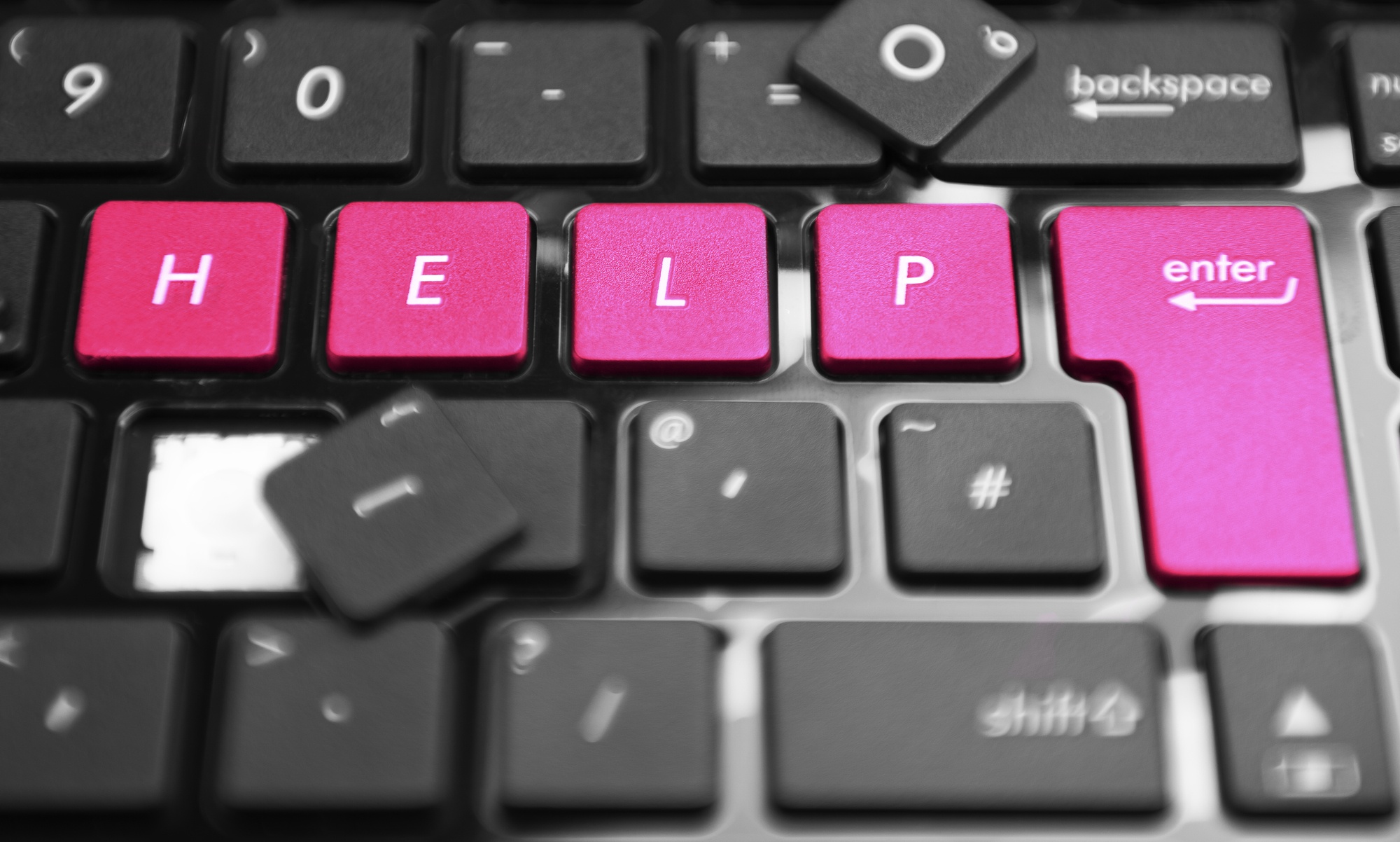 IT Support Desks represented by pink keyboard keys spelling help