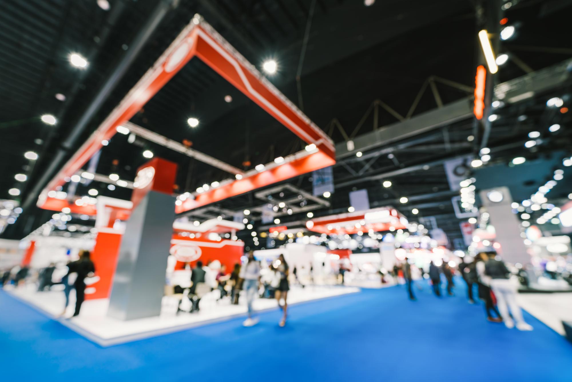 Blurred tradeshow standing in for CES 2023