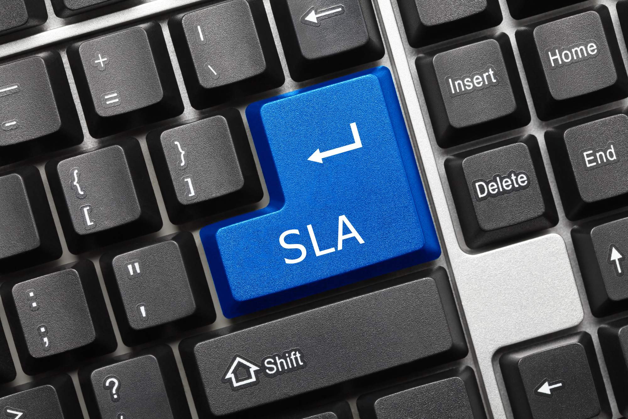 SLAs conceptualized as a blue button on a keyboard